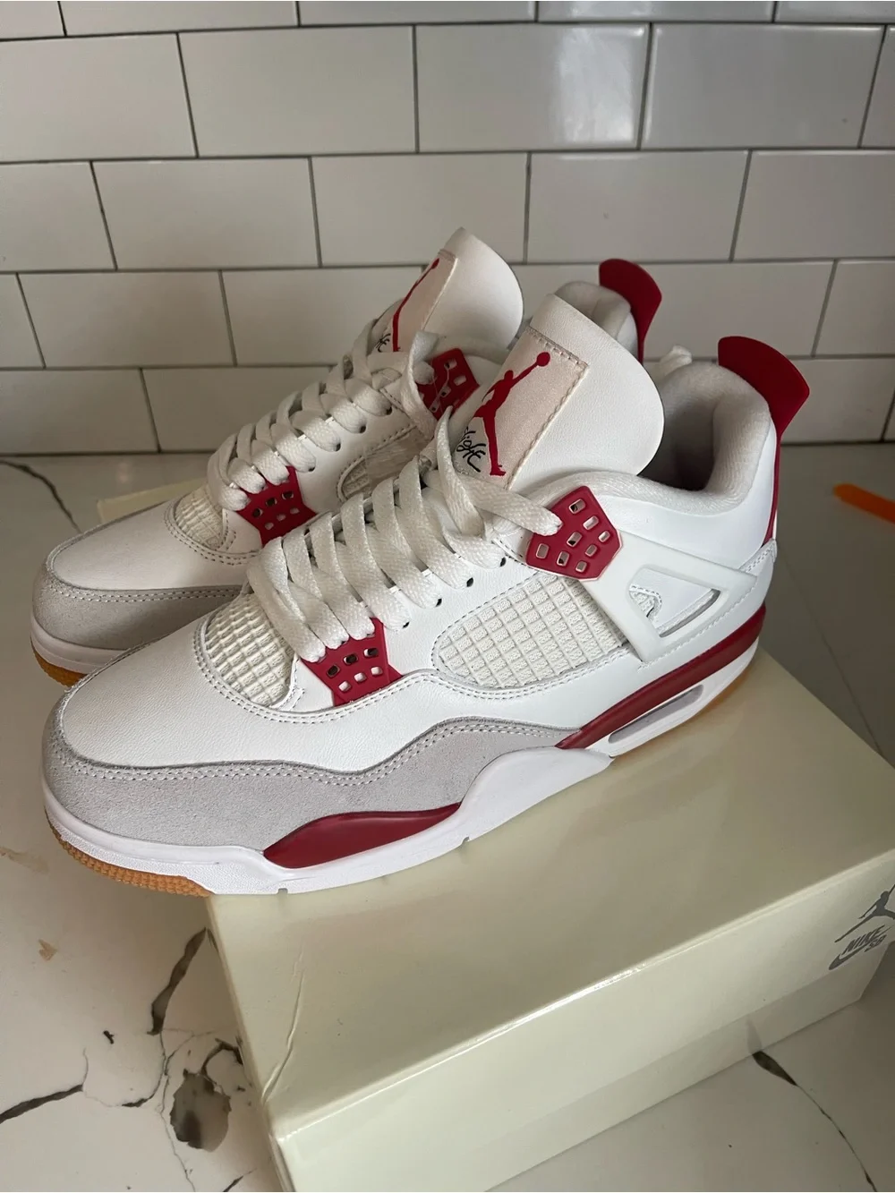 Men’s Retro 4 SB Varsity Red Size 7.5.